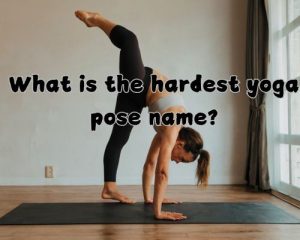 a woman doing the tripod headstand yoga pose